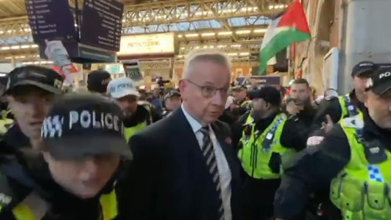 Michael Gove mobbed by pro-Palestinian demonstrators at Victoria station