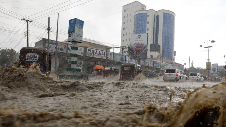 Motorists drive through a flooded street following heavy rains in Mogadishu, Somalia November 8, 2023 REUTERS/Feisal Omar