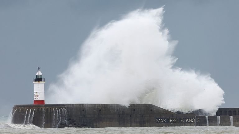 A wave crashes over Newhaven harbour wall, as Storm Ciaran hits the English coast, in Newhaven, Britain, November 2, 2023. REUTERS/Peter Cziborra
