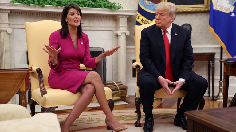 Outgoing U.S. Ambassador to the United Nations Nikki Haley talks with President Donald Trump in the Oval Office of the White House after the president accepted Haley&#39;s resignation in Washington, U.S., October 9, 2018. REUTERS/Jonathan Ernst