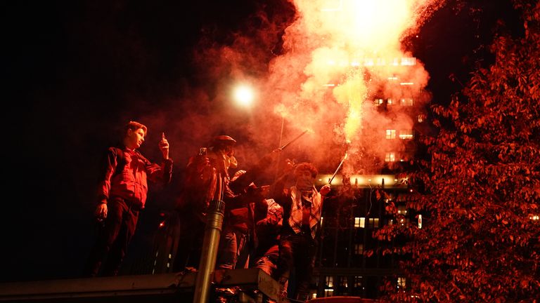 People set off fireworks during a pro-Palestinian protest in London, marching from Hyde Park to the US embassy in Vauxhall. Picture date: Saturday November 11, 2023.