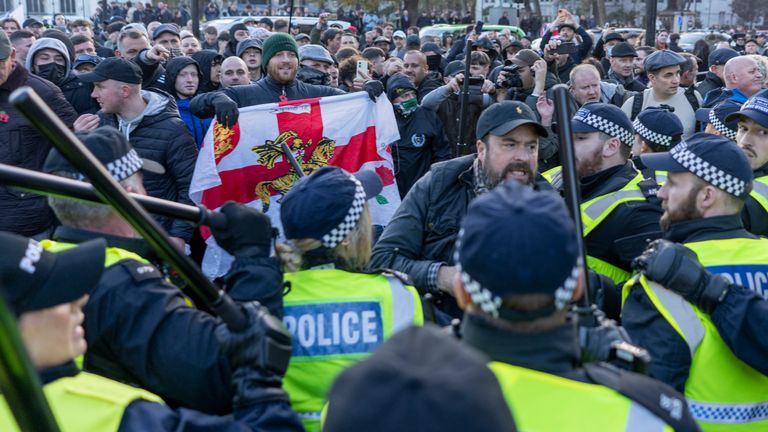 Counter-protesters clash with police in Parliament Square in central London, during pro-Palestinian protest march which is taking place from Hyde Park to the US embassy in Vauxhall. Picture date: Saturday November 11, 2023.