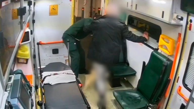 Paramedic is pushed from ambulance by aggressive patient