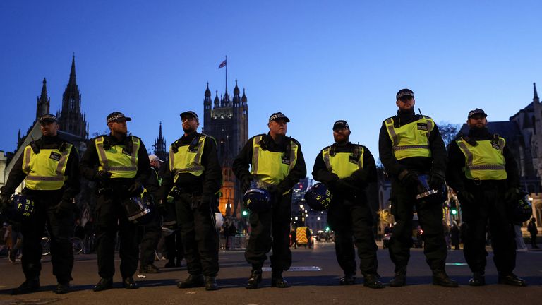 Police officers stand guard near the Palace of Westminster in Whitehall, as people protest in solidarity with Palestinians in Gaza, during a temporary truce between Palestinian Islamist group Hamas and Israel, in London, Britain, November 25, 2023. REUTERS/Hollie Adams