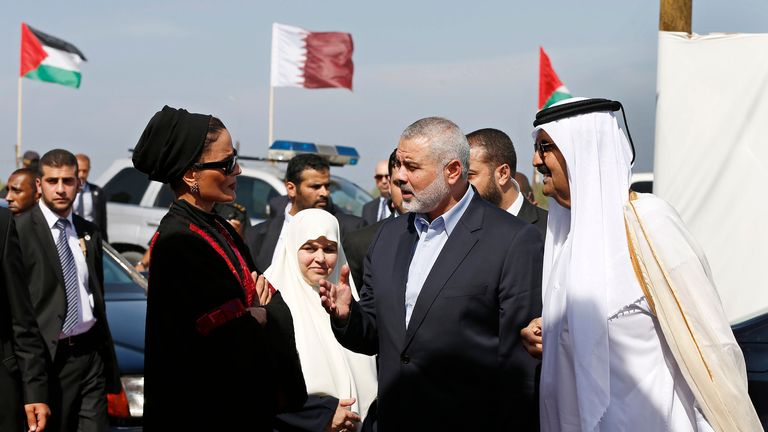 Former Emir of Qatar and his wife with Hamas leader Ismail Haniyeh in Gaza in 2012