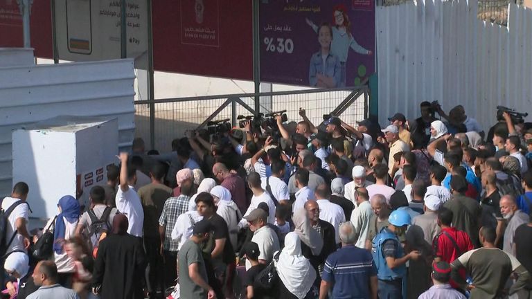 People at the  the Rafah border crossing with Egypt
Pic:AP