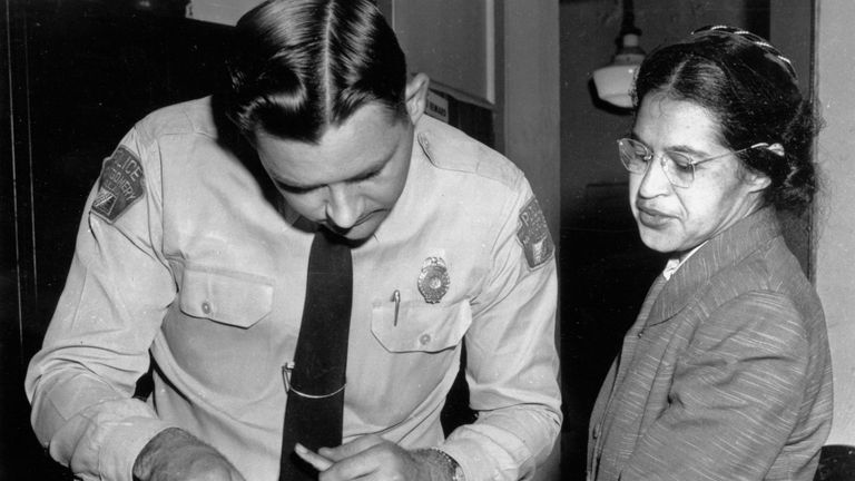 Rosa Parks - FILE - In this Feb. 22, 1956, file photo, Rosa Parks is fingerprinted by police Lt. D.H. Lackey in Montgomery, Ala., two months after refusing to give up her seat on a bus for a white passenger on Dec. 1, 1955. She was arrested with several others who violated segregation laws. Parks&#39; refusal to give up her seat led to a boycott of buses by blacks in December 1955, a tactic organized by the Rev. Dr. Martin Luther King Jr., which ended after the U.S. Supreme Court deemed that all seg