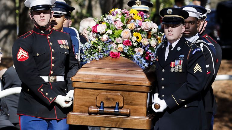 An Armed Forces body bearer team carries the casket of former first lady Rosalynn Carter from the Jimmy Carter Presidential Library and Museum,Tuesday, Nov. 28, 2023, in Atlanta. (Erik S. Lesser/Pool via AP)