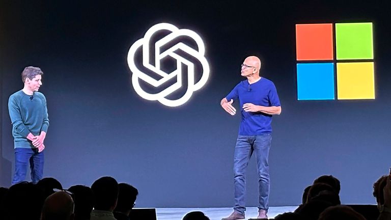 (L-R) Sam Altman and Microsoft CEO Satya Nadella on stage together at a conference on 6 November