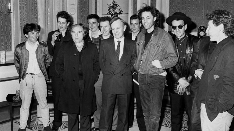 Pop stars fronted by Bob Geldof, at the Irish Embassy in London to give details to Ireland&#39;s Ambassador Noel Dorr, about Self Aid, a 12 hour concert in Dublin to focus on the country&#39;s unemployment problems. From left: Pete Briquette (Boomtown Rats), Shane Macgowan (The Pogues), Van Morrison, Spider Stacey, Jem Finer (both Pogues), Noel Dorr, James fearnley (The Pogues), Bob Geldof, Elvis Costello, Cait O&#39;Riodian (Pogues, hidden) and Paul Brady.