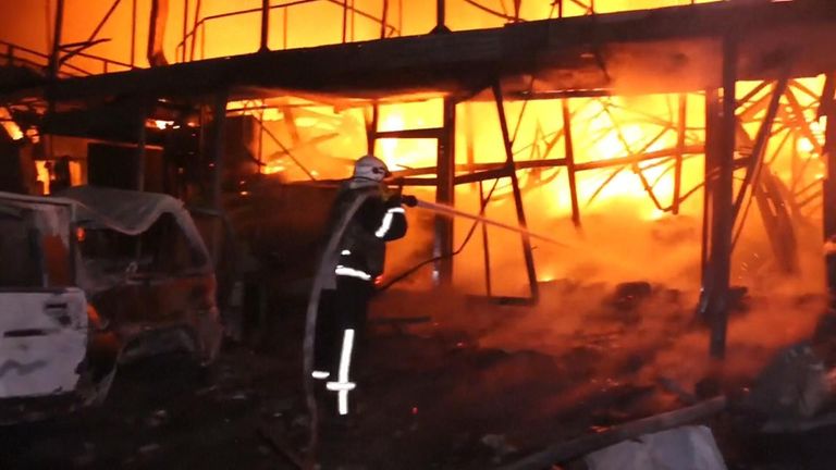 Firefighters tackle fire Ukraine Kharkiv drone attack flame blaze