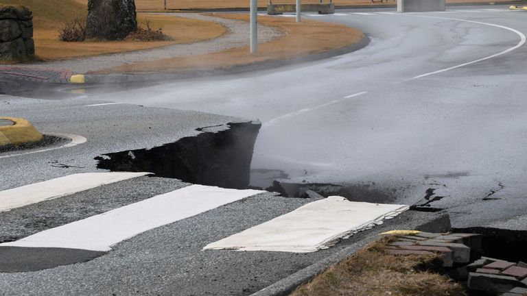 A road is damaged in the village of Grindavik, which was evacuated due to volcanic activity, in Iceland November 14, 2023. REUTERS/Ben Makori