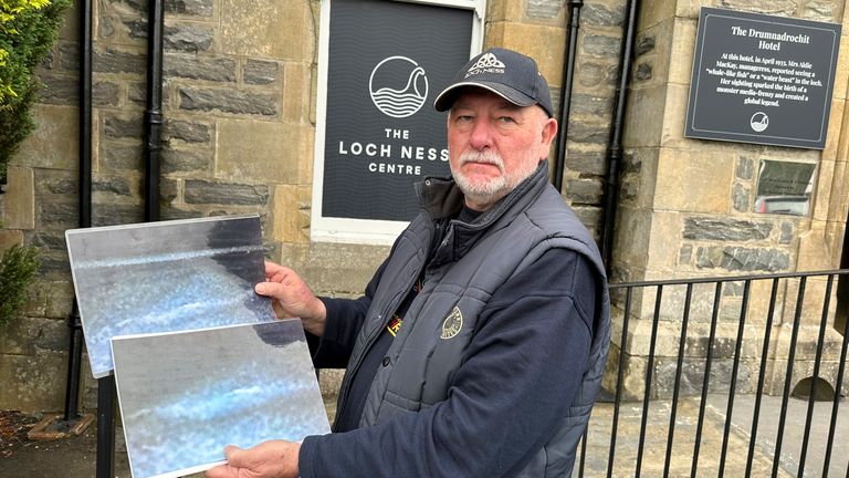 Willie Cameron, known as "Mister Loch Ness," shows photos of his sighting of an unknown animal creature in Loch Ness. In Scotland on Saturday began what is believed to be the largest search for the Loch Ness monster, called Nessie, in decades.