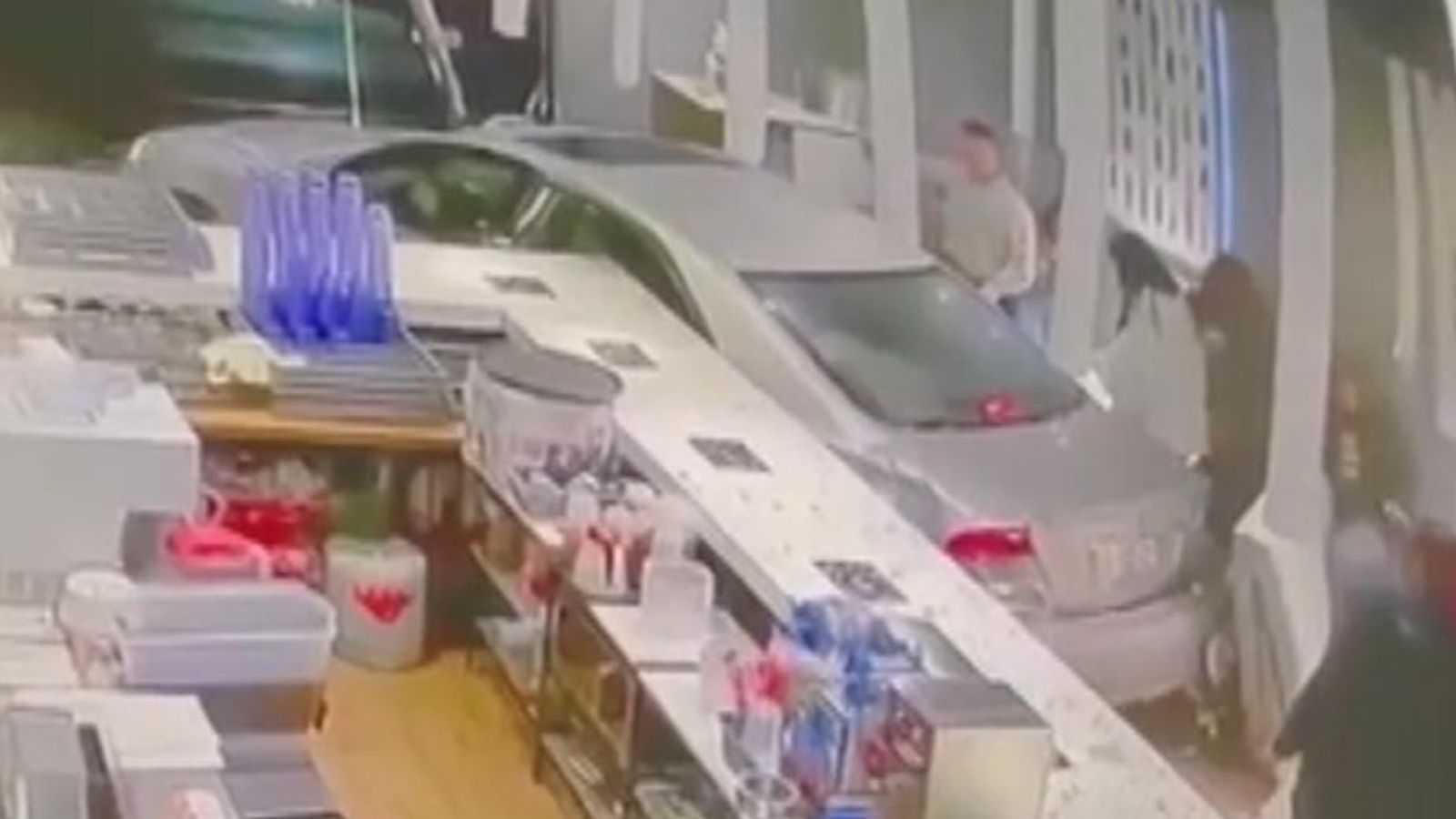 Washington: CCTV captures moment car reverses into hot pot restaurant ...