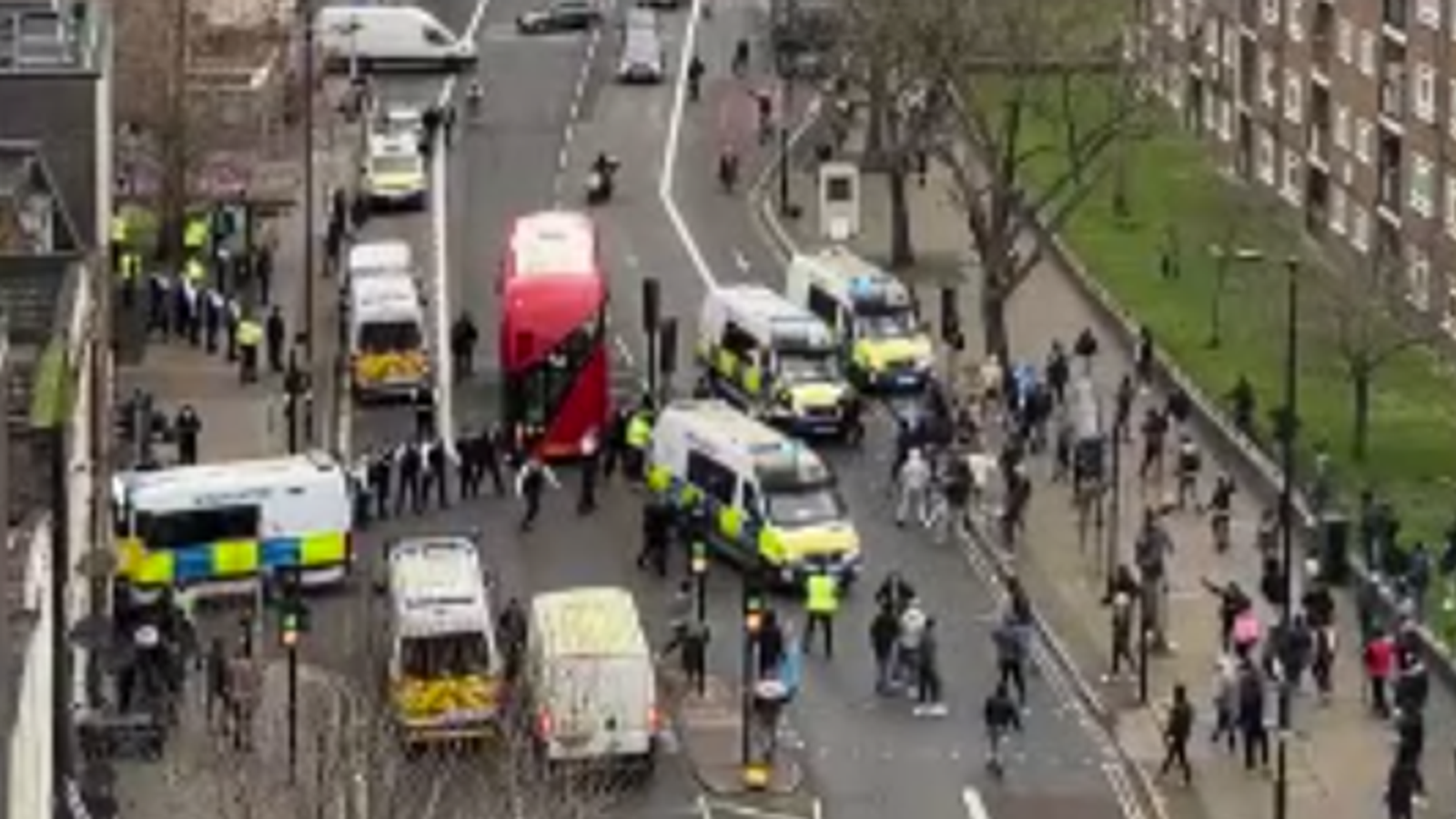 Southwark: Four officers injured in clashes with protesters in south London - as police arrest eight people