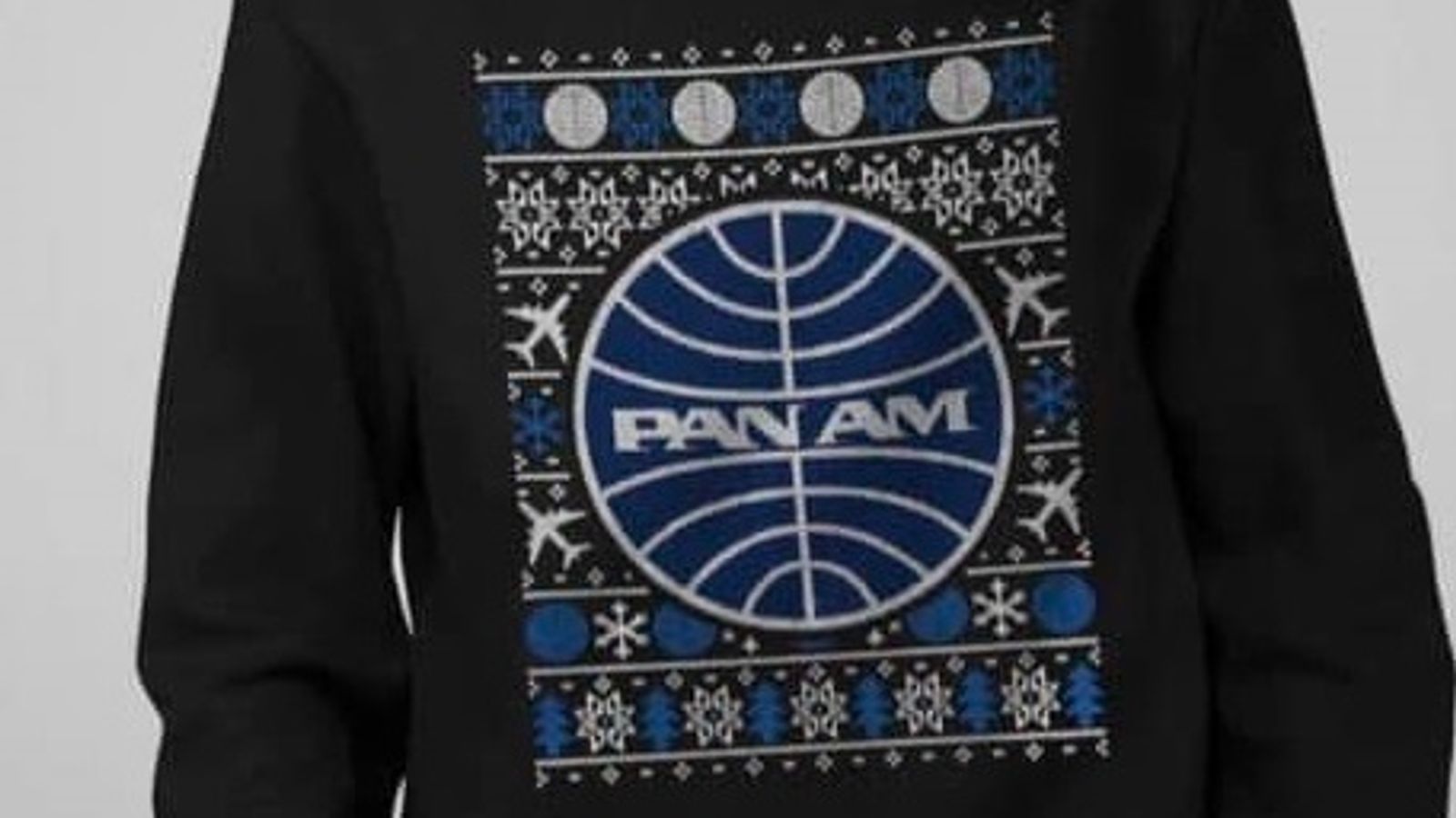 Next pulls `offensive` Pan Am Christmas jumper after Lockerbie counter