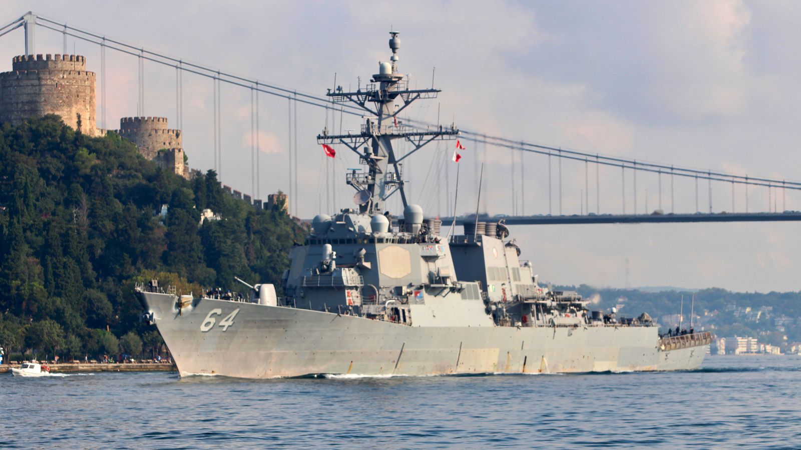 Three commercial ships attacked by missiles in Red Sea - as USS Carney shoots down armed drones