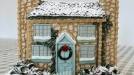 Cake version of the cottage from the Christmas film The Holiday made by Bridie West. Pic: PA