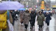 People walk in the rain in central Glasgow, as wet weather warnings have been issued for parts of the UK as heavy rain could bring flooding and travel disruption over the next few days. Picture date: Tuesday December 12, 2023. PA Photo. See PA story WEATHER Rain. Photo credit should read: Andrew Milligan/PA Wire 