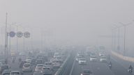 Traffic moves along a highway shrouded in heavy smog in New Delhi, India, December 26, 2023. REUTERS/Anushree Fadnavis
