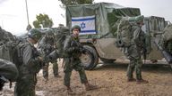 Israeli soldiers prepare to enter the Gaza Strip (Pic: AP)