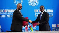 Home Secretary James Cleverly and Rwandan Minister of Foreign Affairs Vincent Biruta sign a new treaty. The treaty will address concerns by the Supreme Court, including assurances that Rwanda will not remove anybody transferred under the partnership to another country.  Picture date: Tuesday December 5, 2023. PA Photo. See PA story POLITICS Rwanda. Photo credit should read: Ben Birchall/PA Wire 