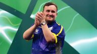 Luke Littler celebrates victory over Raymond van Barneveld