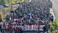 Migrants depart from Tapachula, Mexico, Sunday, Dec. 24, 2023. The caravan started the trek north through Mexico just days before U.S. Secretary of State Antony Blinken arrives in Mexico City to discuss new agreements to control the surge of migrants seeking entry into the United States. (AP Photo/Edgar H. Clemente)