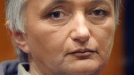Monique Olivier, the wife of self-confessed French serial killer Michel Fourniret, is seen at the start of her trial in Charleville-Mezieres, northern France, Thursday, March 27, 2008. Fourniret, 66, is charged with kidnapping, rape and murder in connection with the deaths of seven young women killed in France and Belgium between 1987 and 2003. Olivier, 59, has been charged with complicity in five murders. Both face life in prison if convicted. (AP Photo/Denis Charlet, Pool)