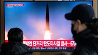 A TV screen shows a file image of North Korea's missile launch during a news update at the Seoul Railway Station in Seoul, South Korea. Pic: AP Photo/Ahn Young-joon