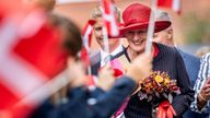 FILE PHOTO: Danish Queen Margrethe is celebrated with a folk festival and performance at The Island(Oen) in Alleroed during a city visit to Alleroed Municipality, Denmark September 12, 2023. Ritzau Scanpix/Ida Marie Odgaard/via REUTERS ATTENTION EDITORS - THIS IMAGE WAS PROVIDED BY A THIRD PARTY. DENMARK OUT. NO COMMERCIAL OR EDITORIAL SALES IN DENMARK./File Photo