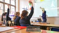 File photo dated 12/09/18 of a teacher and students in a classroom. Secondary schools with the most disadvantaged pupils have been hit hardest by funding cuts over the last decade, according to new research. The findings of an Institute for Fiscal Studies study have been called a &#39;damning indictment&#39; of the Government.