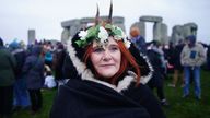 People take part in the winter solstice celebrations at the Stonehenge prehistoric monument on Salisbury Plain in Wiltshire. Picture date: Friday December 22, 2023. PA Photo. Photo credit should read: Ben Birchall/PA Wire