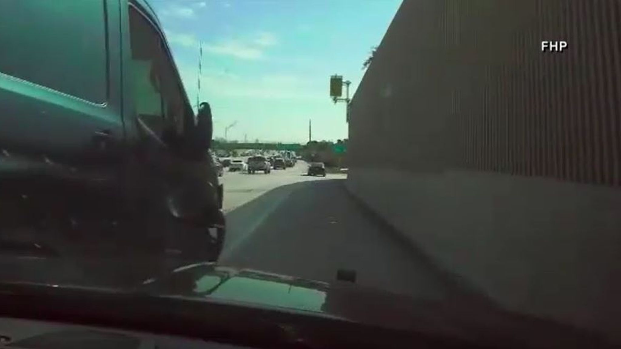Police dashcam footage shows officers smash into Amazon van during high