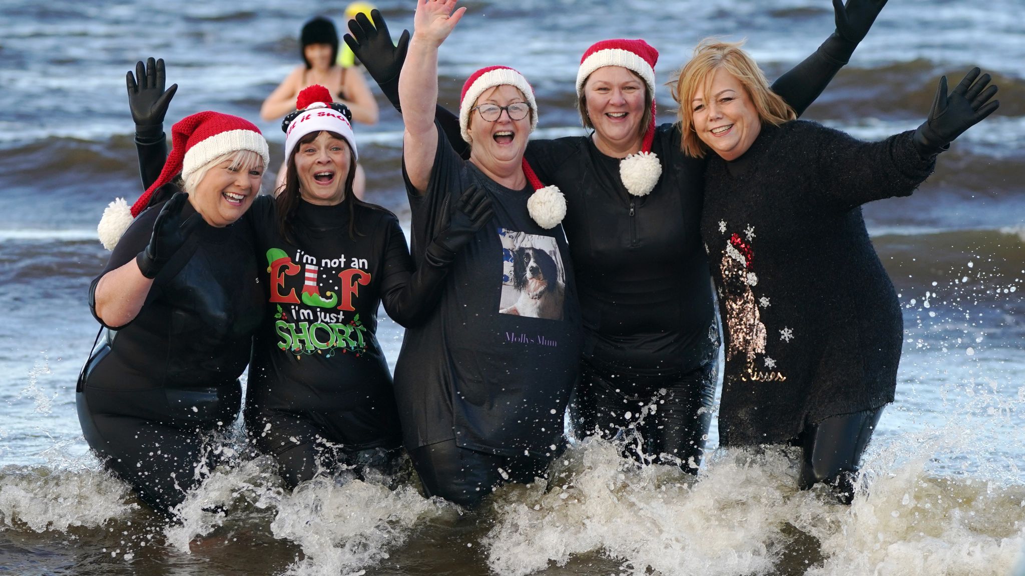 Boxing Day in pictures across the country as UK splashes, shops and