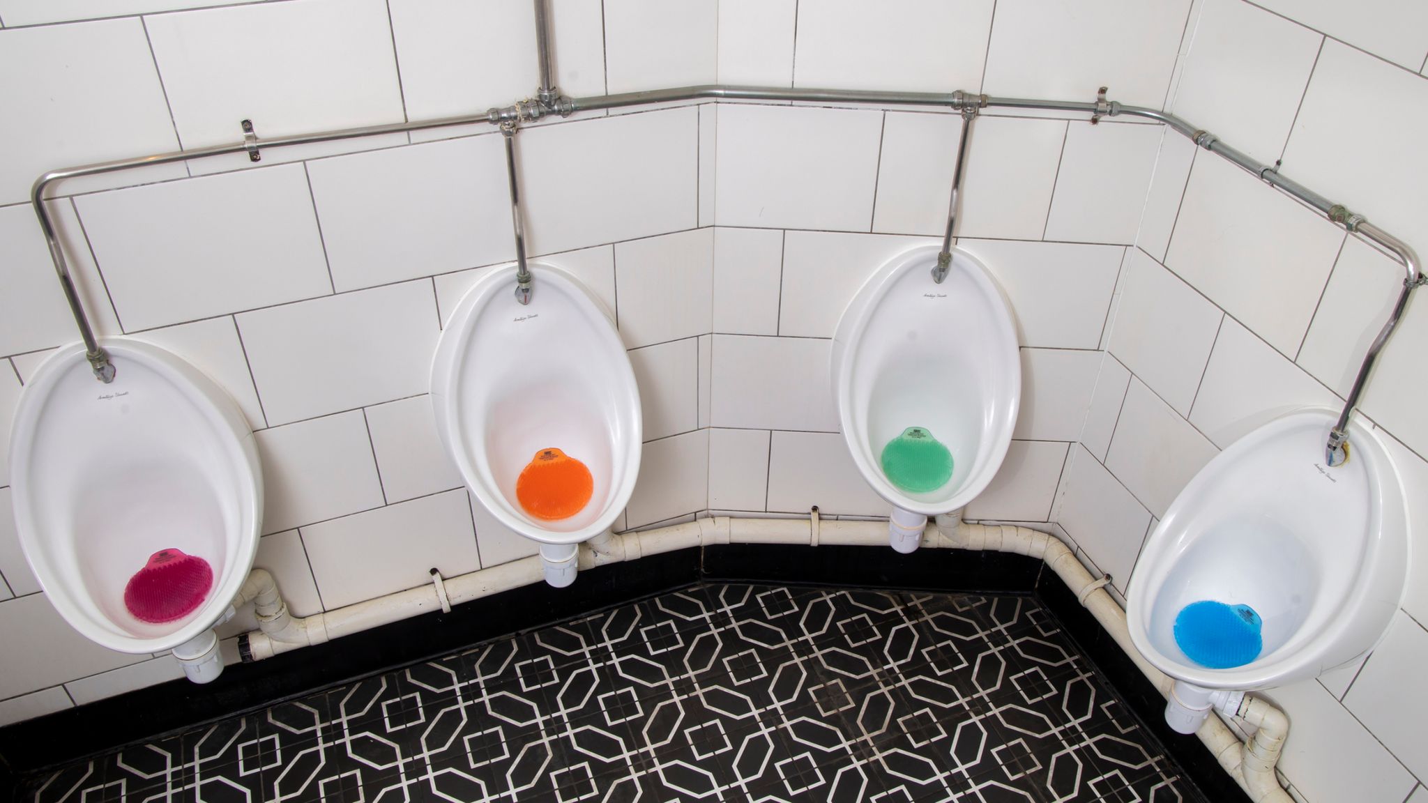 NHS to put warnings about cancer symptoms on urinal mats in pubs