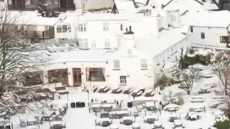 Drone footage shows parts of Cumbria blanketed in snow