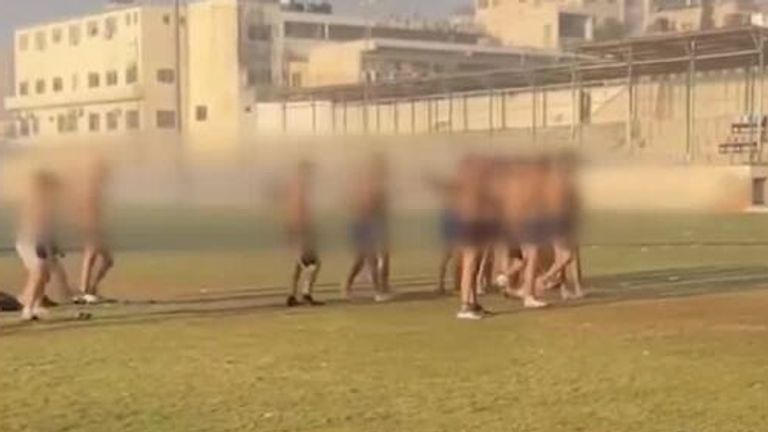 People appear to be detained in football stadium in Gaza