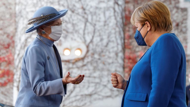 Then-German chancellor Angela Merkel welcomes Queen Margrethe at the Chancellery in Berlin in 2021