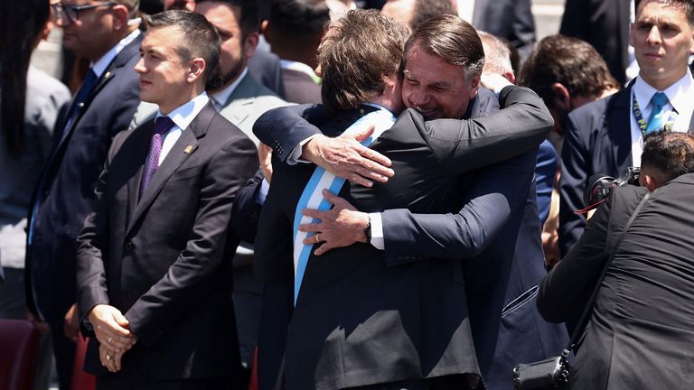 Argentina&#39;s President Javier Milei is embraced by Brazil&#39;s former President Jair Bolsonaro, after Milei&#39;s swearing-in ceremony, outside the National Congress, in Buenos Aires, Argentina December 10, 2023. REUTERS/Agustin Marcarian
