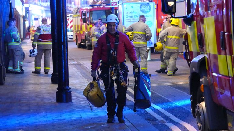 Firefighters at the scene after they were called to a blaze at Blackpool Tower which was actually "orange netting", Lancashire Police have said. Lancashire Fire and Rescue Service said it had six fire engines in attendance on the promenade. Picture date: Thursday December 28, 2023. PA Photo. See PA story FIRE Blackpool. Photo credit should read: Michael Holmes/PA Wire