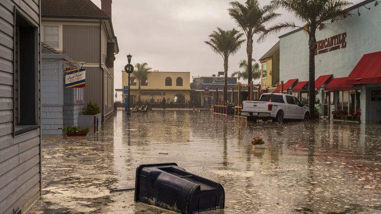 The streets are flooded in Capitola, Calif., Thursday, Dec. 28, 2023. Powerful surf is rolling onto beaches connected The West Coast and Hawaii arsenic a large swell generated by The stormy Pacific Ocean pushes toward shorelines. (AP Photo/Nic Coury)