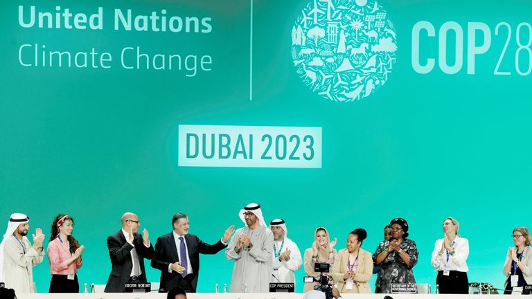 COP28 President Sultan Ahmed Al Jaber in Dubai (centre)