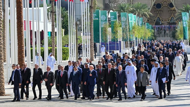 World leaders walk down Al Wasl after the group photo during the United Nations Climate Change Conference (COP28), in Dubai, United Arab Emirates, December 1, 2023. COP28/Anthony Fleyhan/Handout via REUTERS THIS IMAGE HAS BEEN SUPPLIED BY A THIRD PARTY.