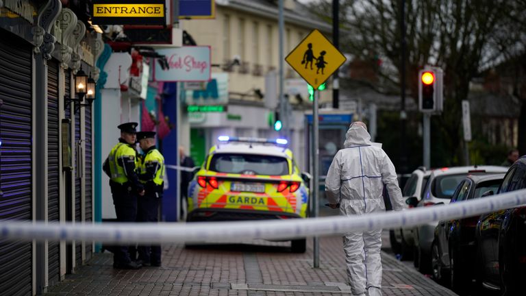 A forensic investigator at the scene in Blanchardstown, Dublin, where a man aged in his 20s was pronounced dead after being injured during a shooting incident at Browne&#39;s Steakhouse restaurant. A man aged in his 40s remains in a serious condition in Connolly Hospital after being treated for gunshot wounds. Picture date: Monday December 25, 2023.