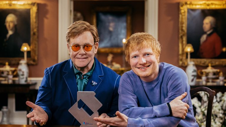 Undated handout photo issued by Official Charts Company of Ed Sheeran (right) and Sir Elton John who&#39;s festive collaboration Merry Christmas has gone straight to the top of the UK singles chart. Issue date: Friday December 10, 2021.