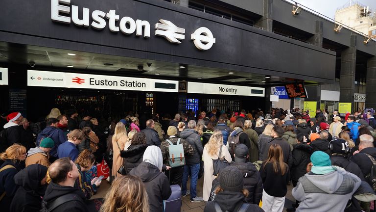 Passengers at Euston Station, London, as travellers get an early start to their Christmas journeys ahead of the weekend. Strong winds are disrupting the start of the Christmas getaway for millions of people. Train services across large parts of Britain are being affected by Storm Pia as fallen trees and other debris damage overhead power lines and block tracks. Picture date: Thursday December 21, 2023.
