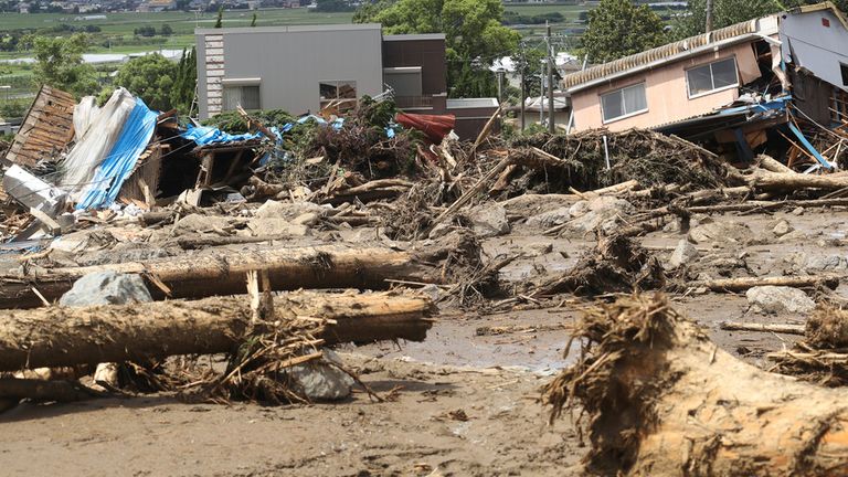 A photo shows mud and debris due to the flood of torrential rain in Kurume City, Fukuoka Prefecture, northern Kyushu region, on July 11, 2023. A series of linear precipitation bands brought heavy rainfall to Fukuoka, Oita and Saga prefectures from July 9th. At least six people died, and three others have been missing.( The Yomiuri Shimbun via AP Images )