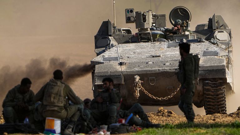 Pic: AP
An Israeli APC maneuvers near the Gaza Strip border, in southern Israel, Friday, Dec. 29, 2023. The army is battling Palestinian militants across Gaza in the war ignited by Hamas&#39; Oct. 7 attack into Israel. (AP Photo/Ariel Schalit)