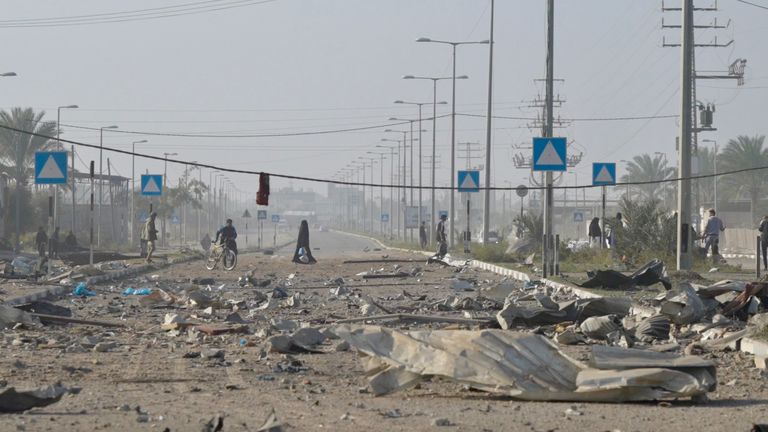 Residents walking through war-torn Gaza 